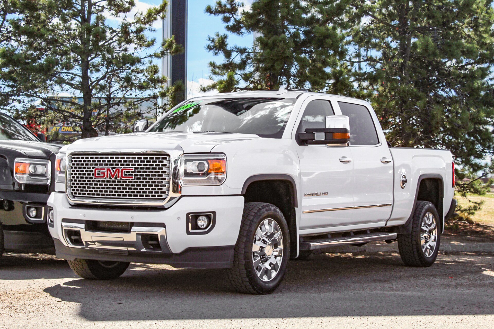 pre-owned-2015-gmc-sierra-2500-denali-z71-4wd-crew-cab-pickup-free